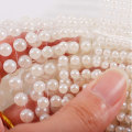 Miniatyrbillede 4 af 5: Beige Halvrunde Kunstige Perler Stickers Selvklæbende Perle Stickers Flad Bag Perle Stick på Hvide Perle Applikationer Pynt (4MM)