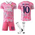 Miniatyrbild 1 av 2: 25-26 Real Madrid CF Rosa Drakmönster Special Anniversary Edition NO.10 MODRIC Tröjor Barn Vuxen Fotbollsutrustning med Strumpor NO.10 24
