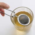 Miniatyrbilde 4 av 5: Te-infuser Håndtak Te-kule Sfære Mesh Te-sil Kaffe Urte Krydder Filter Diffuser Kjøkkenredskap