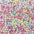 Miniatyrbillede 1 af 5: En pakke med akrylperler i tre størrelser - transparente illusion blandede farver