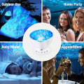 Miniatyrbilde 5 av 5: Havbølgeprojektor, 12 LED nattlyslampe med justerbar lysstyrke, fjernkontroll, timer, 8 lysmoduser, musikksøyle, nattlys, projektor