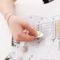 Miniatyrbild 3 av 3: 1 st Zinklegering Gitarrplektrum Basgitarrplektrum Ukulele Gitarrplektrum Tillbehör (Gyllene)