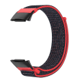 Pikkukuva 2 / 2: Fitbit Charge 6:n punainen nylonranneke