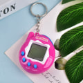 Miniatyrbillede 1 af 5: Elektronisk kæledyrsmaskine håndholdt virtuel kæledyrsmaskine spilmaskine elektronisk legetøj kæledyrsmaskine [DB] pink