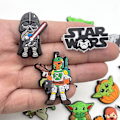 Pikkukuva 5 / 5: 25 kpl Star Wars -kenkäkoristeet Croc-tukikengille [db]