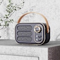 Miniatyrbild 2 av 2: Multifunktionell Mini Bärbar FM-radio Bluetooth-högtalare USB TF AUX Inomhus Utomhus Retro-design Trådlös Högtalare Gray