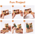 Miniatyrbillede 4 af 5: Plast Hus Bygning Sæt Mini Dukke Hus Fascinerende Bog Butik Gør det selv Miniature Hus Kit med LED lys
