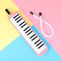 Miniatyrbilde 2 av 7: 32 tangenter Melodica Piano Keyboard Stil Musikal Instrument Harmonica Munn Orgel Med bærepose