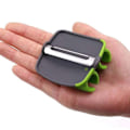 Miniatyrbilde 11 av 11: Palm Peeler Grønnsak Hånd Peeler Swift Hand Palm Grønnsak Frukt Peeler Skutter Kjøkken verktøy