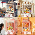 Miniatyrbilde 3 av 9: Wltoys Doll Machine Mynt Operated Play Game Mini Claw Catch Toy Machines Dolls Sweets Machine Barn Interactive Toys