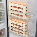 Miniatyrbild 2 av 7: Automatisk rullning Ägg ställ hållare förvaring box ägg korg mat behållare ägg fodral hållare kylskåp förvaring arrangör