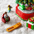 Miniatyrbilde 5 av 7: Bygning Klosser Klosser Gjør-det-selv Jule Tre Musikk Eske Potte Bukett Hjem Dekorasjon Desktop Ornament