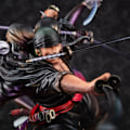 Miniatyrbillede 3 af 7: One Piece Roronoa Zoro Nine knive Flow Anime Figur Model Desktop Ornaments Action Figur Legetøj