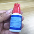 Miniatyrbillede 6 af 6: 10 flasker/lot Original Korea Øjenvipper Extensions Sky lim med rød hætte