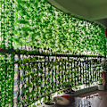 Miniatyrbillede 3 af 7: Bedste kvalitet 11M Kunstig Plante Grøn Ivy Løv Girland Falsk Plante Krybeplante Hængende Vine Udendørs Gør det selv Have Væg Bryllup Fest Hjem Dekor