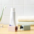 Miniatyrbild 5 av 9: Tandkräm Dispenser Silicon Bottom Rullande Rymd Spara Squeezer