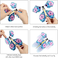 Miniatyrbilde 2 av 5: 10 biter Magic Flying Sommerfugl Vind Leker Gummi Band Powered Romantic