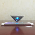Pikkukuva 1 / 3: 3D-hologrammi pyramidi näyttöprojektorin videoteline universaali älypuhelimille
