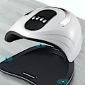 Miniatyrbilde 2 av 2: Neglelampe Neglefototerapimaskin Neglelakkstørker (hvit europeisk)