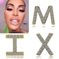 Miniatyrbillede 1 af 5: 26 bogstaver tænder cover rock krystal tænder sag tænder dekor hip hop tee Gold B