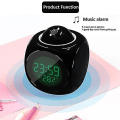 Miniatyrbild 3 av 5: Barn Vit Projektion Digital Väder LCD Klocka Bell Alarm Display Bakgrundsbelysning Projektor Hem Klocka Timer Vuxen Vit Leksak Pudel på Selektivt Fokus