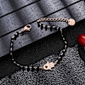 Miniatyrbillede 2 af 7: Palm Charm Armbånd i Rustfrit Stål med Sorte Perler - Enkelt Lykkearmbånd (Rosaguld) rose gold