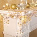 Miniatyrbillede 2 af 2: Indendørs juledekorationer, festlig belyst bærperlekrans guld - 120\" lang