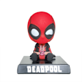 Pikkukuva 1 / 5: Hahmo bobblehead-nukke matkapuhelintelineellä/auton kojelaudan matkapuhelinteline punainen