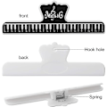 Miniatyrbilde 3 av 5: 4 musikklipp, musikkstativ, pianonotetrykk, for lesing og merking av noter, papirfiler, bilder og bilder, matklipp