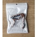 Miniatyrbild 3 av 5: Gitarr capo för akustiska och elektriska gitarrer trä färg (påse)