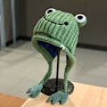 Miniatyrbild 3 av 4: Dam söt groda hatt virkad stickad hatt stora ögon groda stickad vinter öron skydd mössa hattar stickade mössor utomhus höst