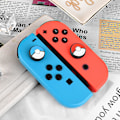Miniatyrbillede 2 af 5: 4 stk. - Røde og blå tegneseriekugler Beskyttende hætter til Switch / Switch Lite / Switch OLED Joy Con