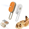 Miniatyrbillede 2 af 5: 1 x 3 i 1 Silikone Massagebørste til Katte og Hunde, Massage Dampbørste, Filt- og Fældningsfjerner, Kæledyrs Dampbørste, Orange og Hvid