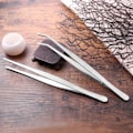 Miniatyrbilde 5 av 5: Set med 2 rustfrie pinsetter (sølv)