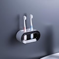 Miniatyrbillede 1 af 4: Dobbelt hul tandbørsteholder badeværelse elektrisk tandbørsteholder punch sort