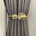 Miniatyrbillede 2 af 4: (Lotusblad) Sæt med 2 moderne gyldne metal gardinholdere - Tilbehør til indretningen af stuen og soveværelset