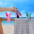 Miniatyrbillede 5 af 5: Håndklædeklemmer til solsenge 4 stk. Multifarvede tøffelklemmer til strandhåndklæder Stærke strandstolsklemmer Tøj klemmer store