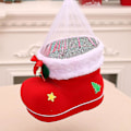 Miniatyrbild 4 av 4: Jultomtens godispåsar i form av röda skor, julklapp, strumpa, heminredning