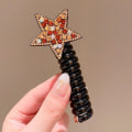 Miniatyrbild 9 av 10: Hårband Hårrep 05 05 05