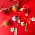 Miniatyrbild 7 av 7: Stickat handväskhänge Good Luck Style STYLE 01 STYLE 01 Style 01