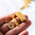 Miniatyrbild 10 av 10: 2/10 st 1:12 Dockhusmynt Miniatyr guldtackor 2 2 2