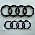Miniatyrbild 1 av 2: AUDI GLOSS BLACK VARUMÄRKESEMBLEM RINGAR FRAM & BAK A1 A3 A4 A5 273MM 192MM - Perfekt