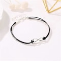 Miniatyrbillede 2 af 5: Bohemia Lagdelt Sort Læder Anklet Uendelighedsknude Charm Vedhæng Fodkæde Boho Strand Fod Smykker til Kvinder og Piger