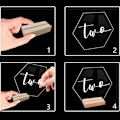 Miniatyrbild 9 av 10: Hexagon akryl bordsnummer skylt med hållare Kit Event Festskyltar Tillbehör för jul Baby Shower Party Dekoration null - B null - B