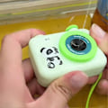 Miniatyrbillede 2 af 5: Dekompression Prank Kamera Vand Spray Legetøj Vand Festival Vand Spray Prop[YJD]