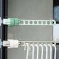 Miniatyrbilde 3 av 4: Innovativ bærbar klesstativ med 8 huller - Vindurammehengeren for husholdning og reiser i grønn Green