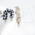 Miniatyrbild 2 av 2: Handledsrem för Mobilfodral Beige