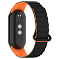 Miniatyrbillede 3 af 3: Magnetisk rem til Xiaomi Mi Band 8 Pro Sort+orange