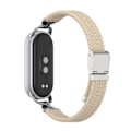 Miniatyrbillede 4 af 5: Stilfuld flettet spænderem til Xiaomi Mi Band 9/10 Abrikos
