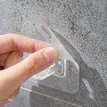 Miniatyrbild 2 av 7: INF Självhäftande hållare för gardinstång 2-pack Transparent